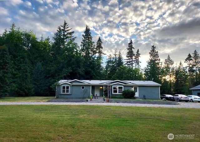 view of front of property with a front lawn