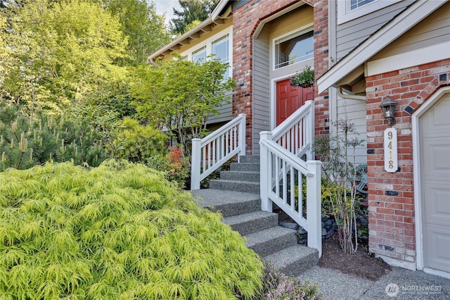 9418 NE Tidal Ct, Bainbridge Island, WA 98110 - entrance to property with a garage and brick siding