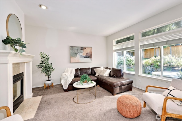 9418 NE Tidal Ct, Bainbridge Island, WA 98110 - carpeted living area with baseboards and a fireplace