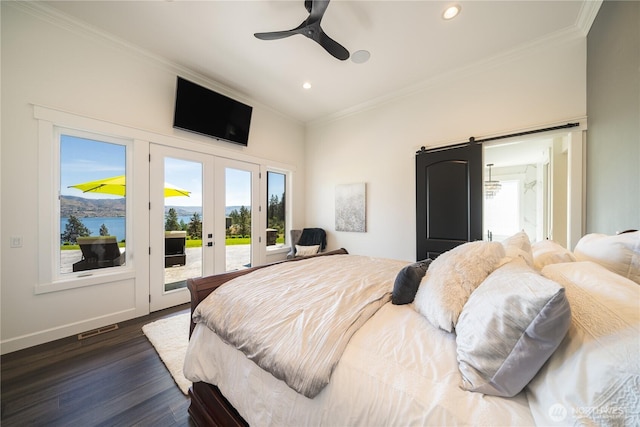 bedroom featuring ornamental molding, french doors, dark wood-type flooring, and access to exterior