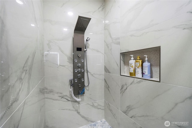 room details with a marble finish shower