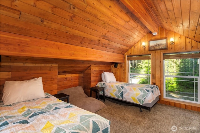 bedroom with vaulted ceiling with beams, carpet floors, wood ceiling, and wooden walls