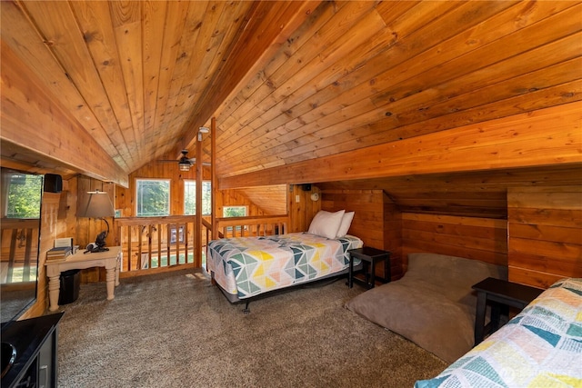 carpeted bedroom with wood walls, wood ceiling, and vaulted ceiling