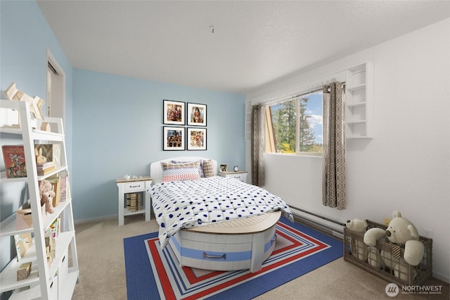 carpeted bedroom with a baseboard radiator