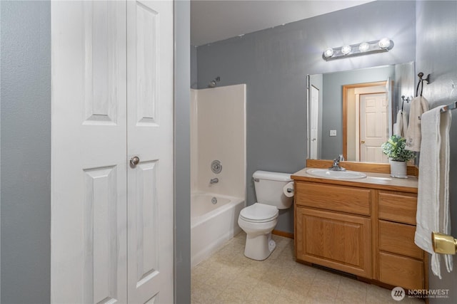 full bath with vanity, toilet, and bathing tub / shower combination