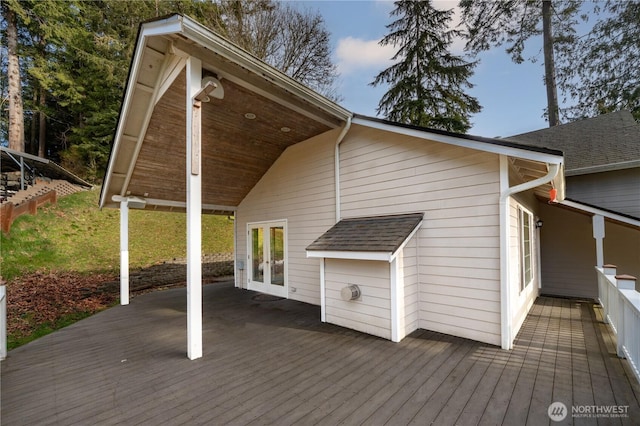 wooden deck featuring french doors