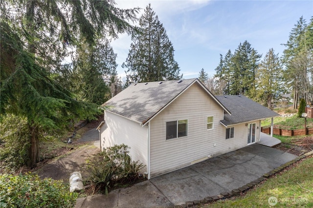 rear view of property with a patio