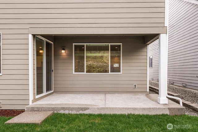 doorway to property with a patio