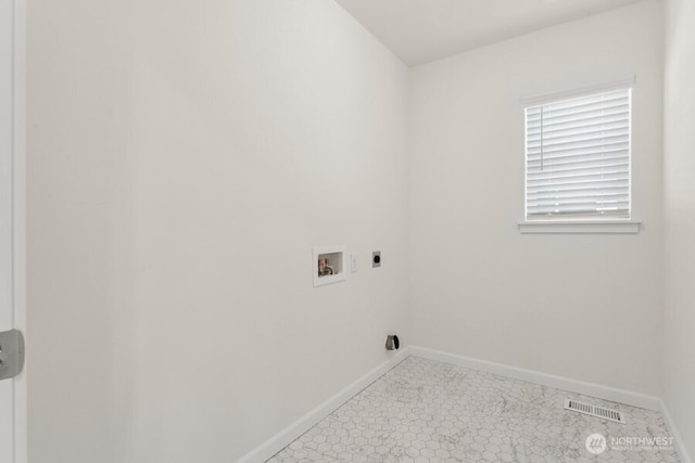 laundry area with washer hookup, visible vents, electric dryer hookup, laundry area, and baseboards