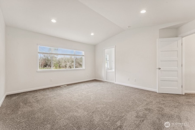 unfurnished room with vaulted ceiling, carpet floors, recessed lighting, and baseboards