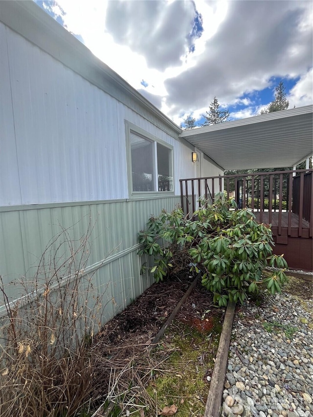 view of home's exterior with a deck