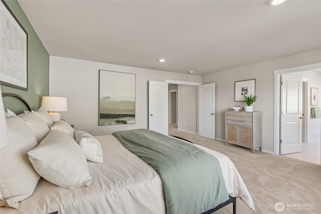 carpeted bedroom featuring recessed lighting and baseboards