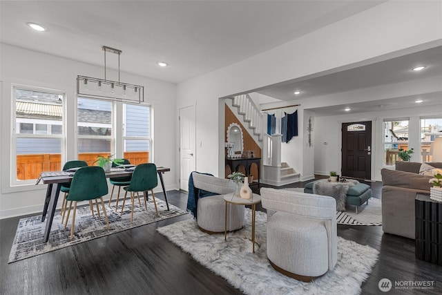 living room with dark wood-style flooring, stairway, recessed lighting, and baseboards