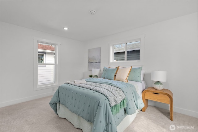 carpeted bedroom with baseboards and recessed lighting