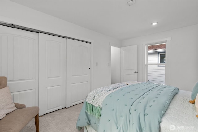 bedroom with a closet and recessed lighting