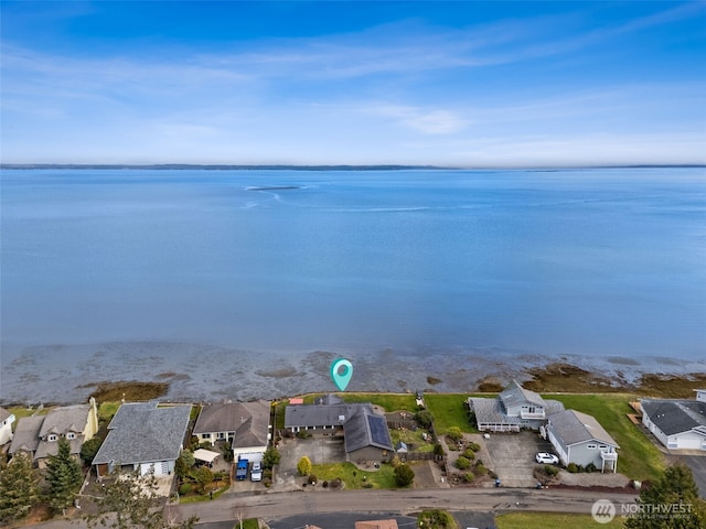 birds eye view of property featuring a residential view and a water view