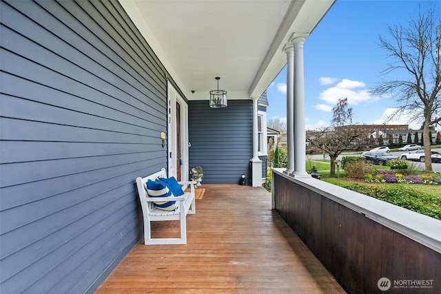 wooden deck featuring covered porch