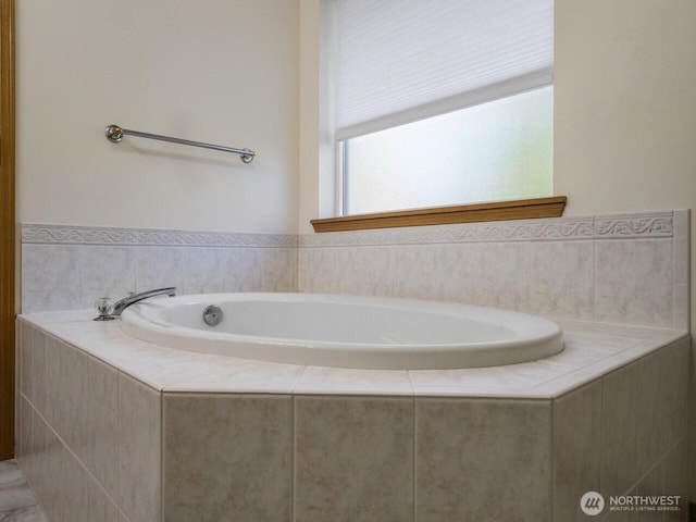 bathroom featuring a garden tub