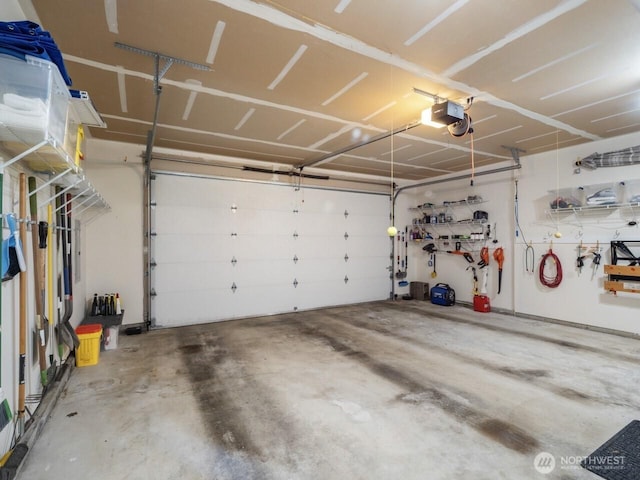 garage featuring a garage door opener