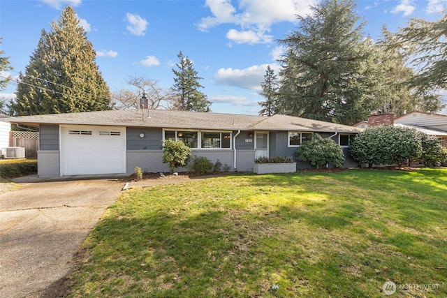 single story home featuring a chimney, a garage, cooling unit, driveway, and a front lawn