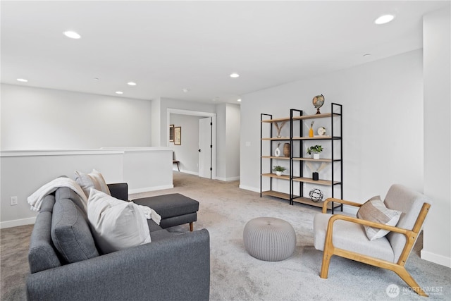 carpeted living room with baseboards and recessed lighting