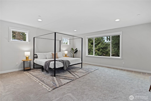 bedroom featuring carpet floors, baseboards, and recessed lighting