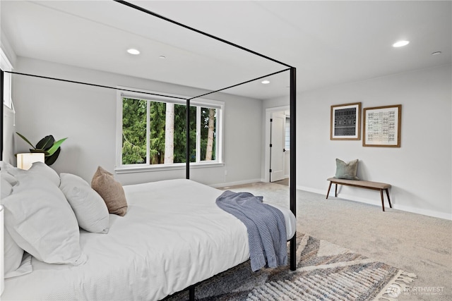 carpeted bedroom with baseboards and recessed lighting