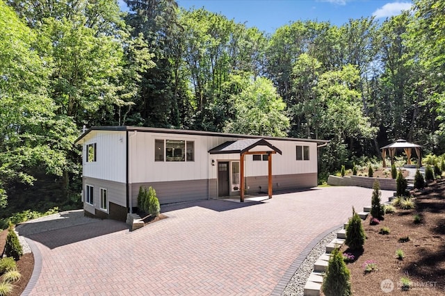 view of front of property featuring a gazebo