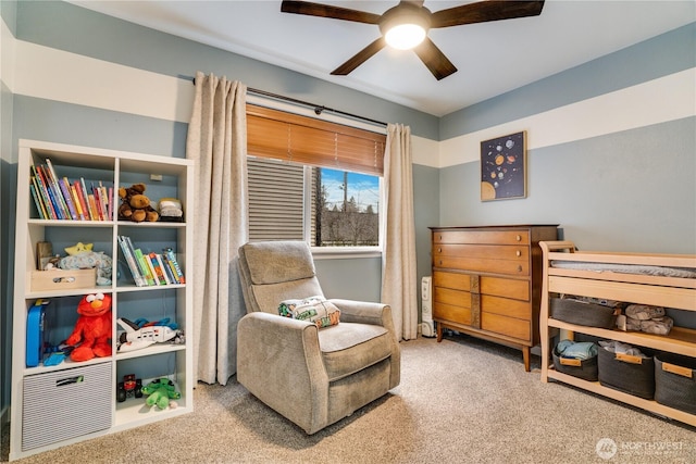 bedroom with a ceiling fan and carpet floors