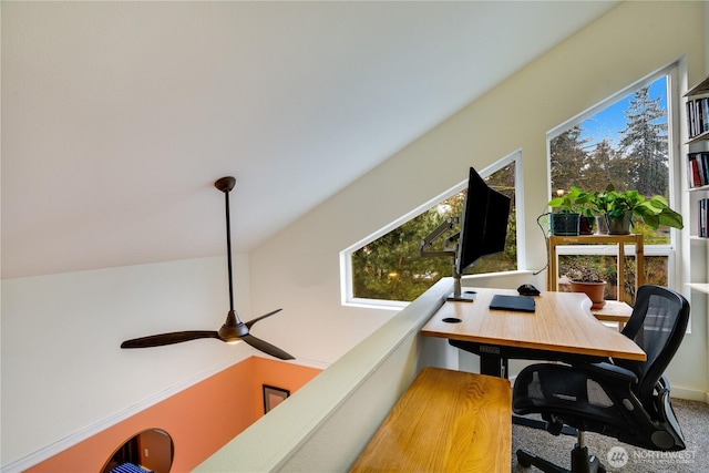 office area featuring carpet, a healthy amount of sunlight, and ceiling fan