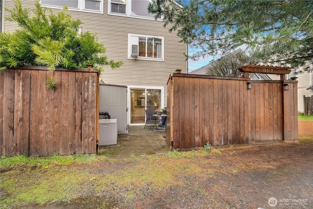 exterior space with a patio and fence