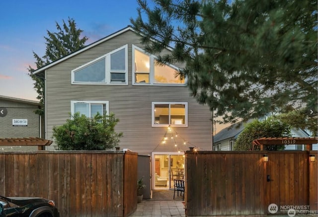 10319 Midvale Ave N Unit A, Seattle, WA 98133 - rear view of house with fence private yard
