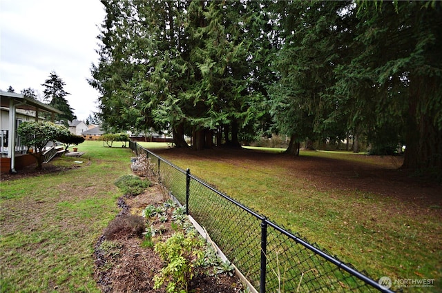 view of yard featuring fence