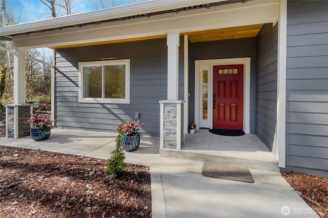 entrance to property with a porch