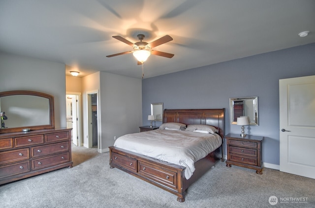 bedroom featuring ceiling fan, carpet flooring, and baseboards