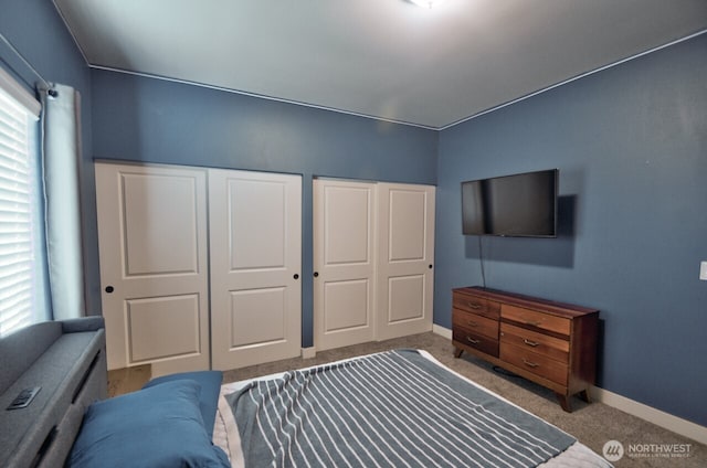 bedroom featuring carpet flooring and baseboards