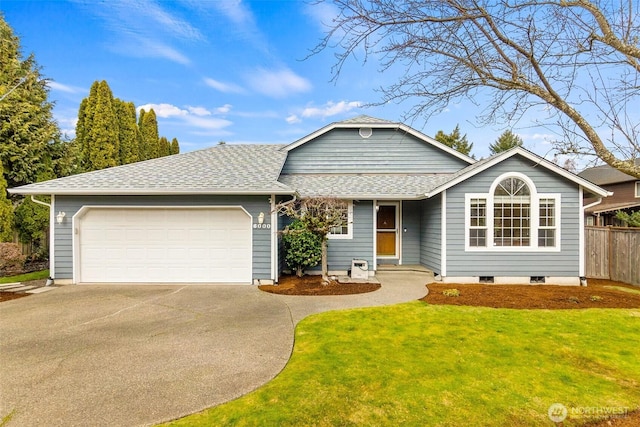 ranch-style home with concrete driveway, roof with shingles, an attached garage, and a front lawn