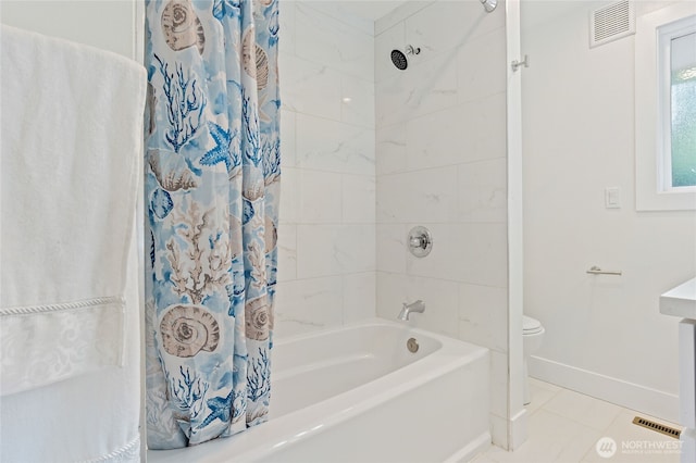 bathroom featuring tile patterned flooring, toilet, visible vents, baseboards, and shower / bathtub combination with curtain