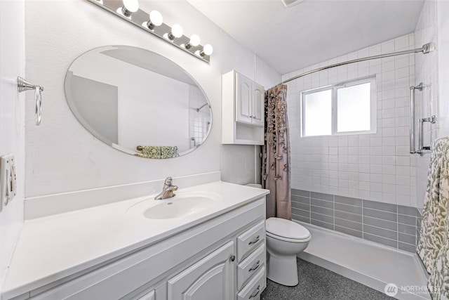 full bathroom with toilet, speckled floor, a shower stall, and vanity