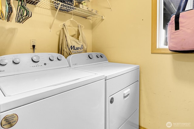 laundry room featuring laundry area and washing machine and clothes dryer