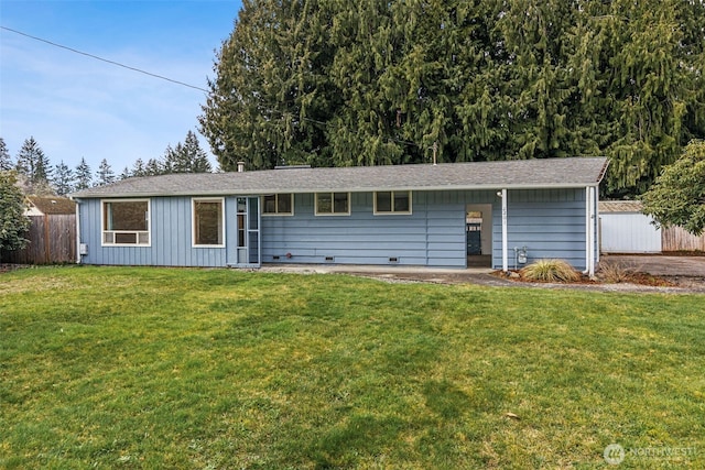 single story home featuring a front yard and fence