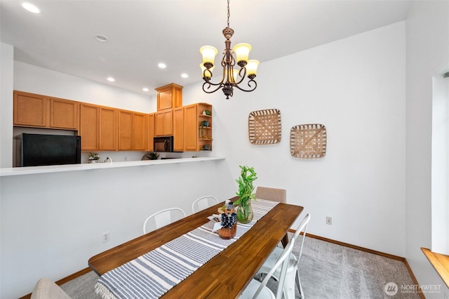 dining space with recessed lighting, light colored carpet, baseboards, and an inviting chandelier