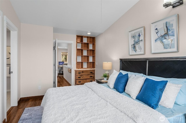 bedroom with wood finished floors