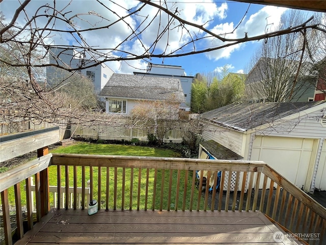 deck with fence and a yard