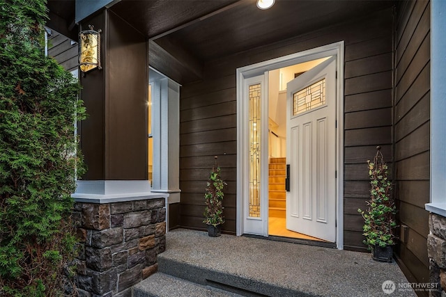 doorway to property with covered porch