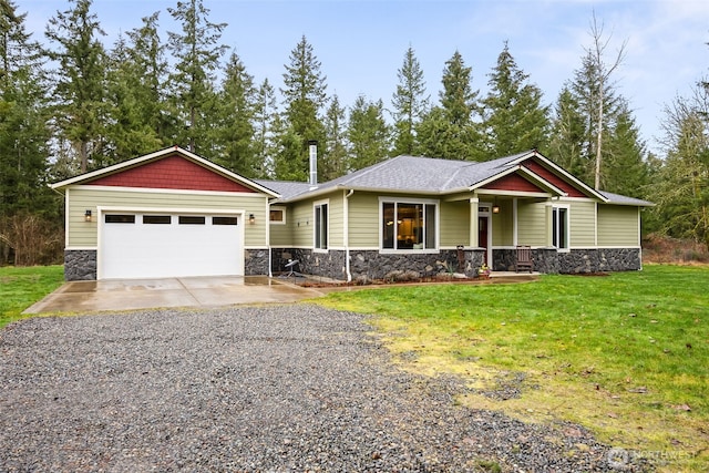 craftsman-style home with an attached garage, concrete driveway, stone siding, and a front yard