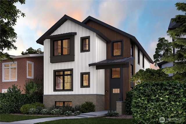 modern farmhouse featuring metal roof, brick siding, a standing seam roof, and board and batten siding