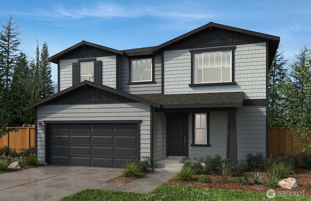 traditional-style home featuring driveway, board and batten siding, an attached garage, and fence