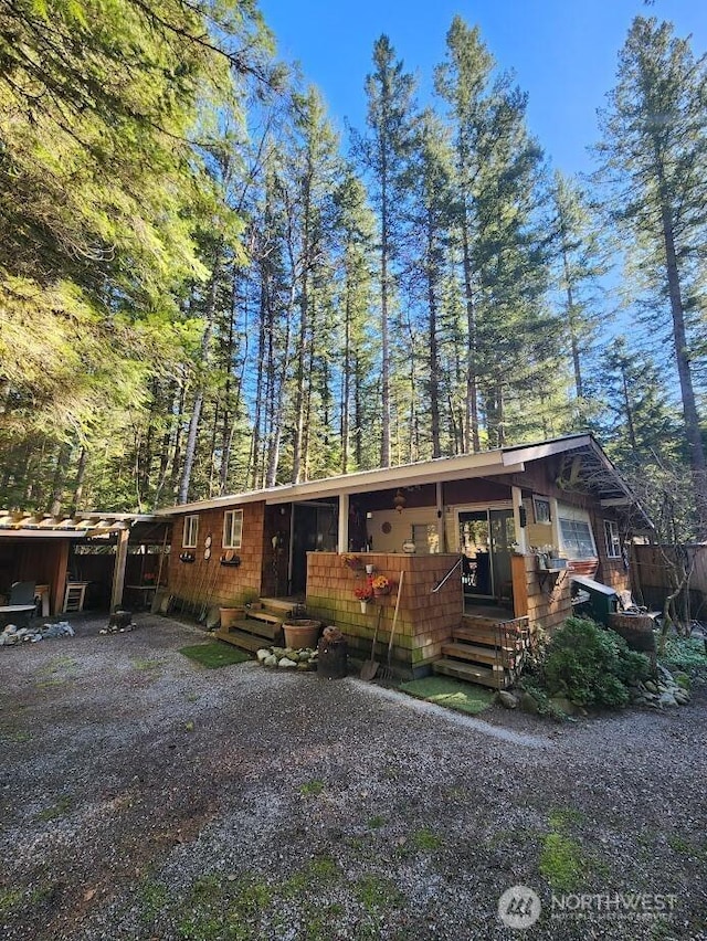 view of front of house with a wooden deck