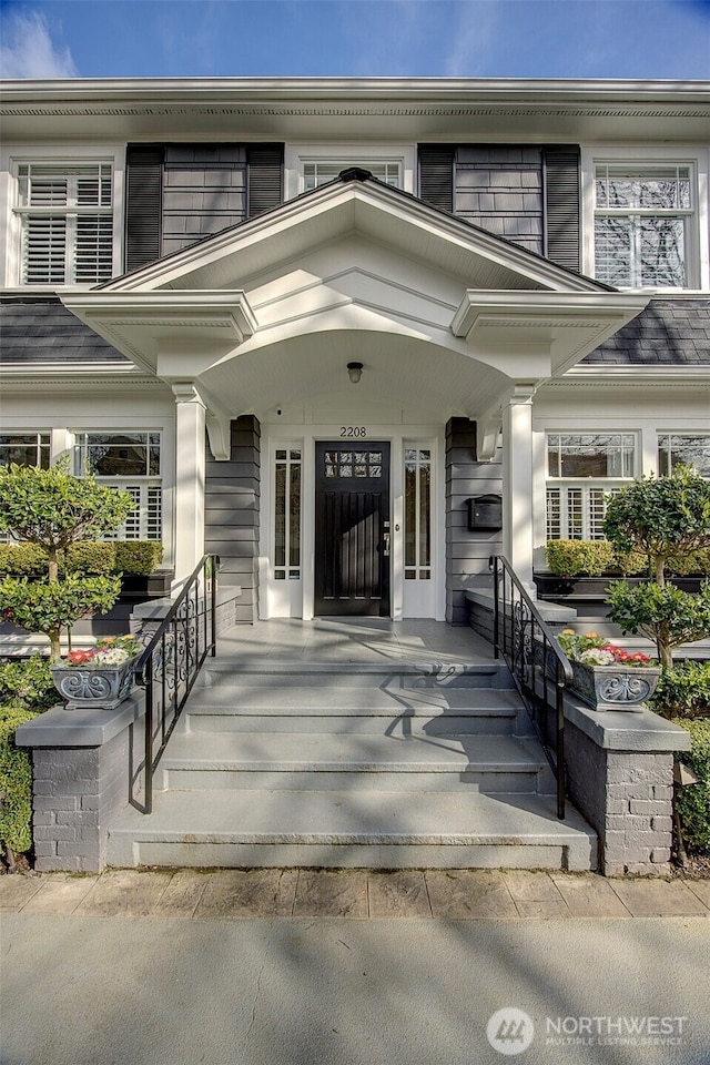 doorway to property with a porch